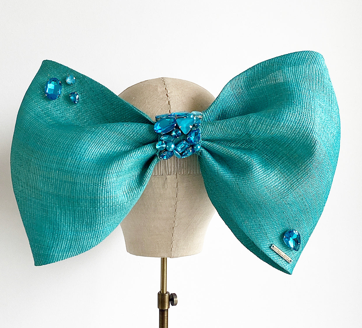 Large teal rear bow