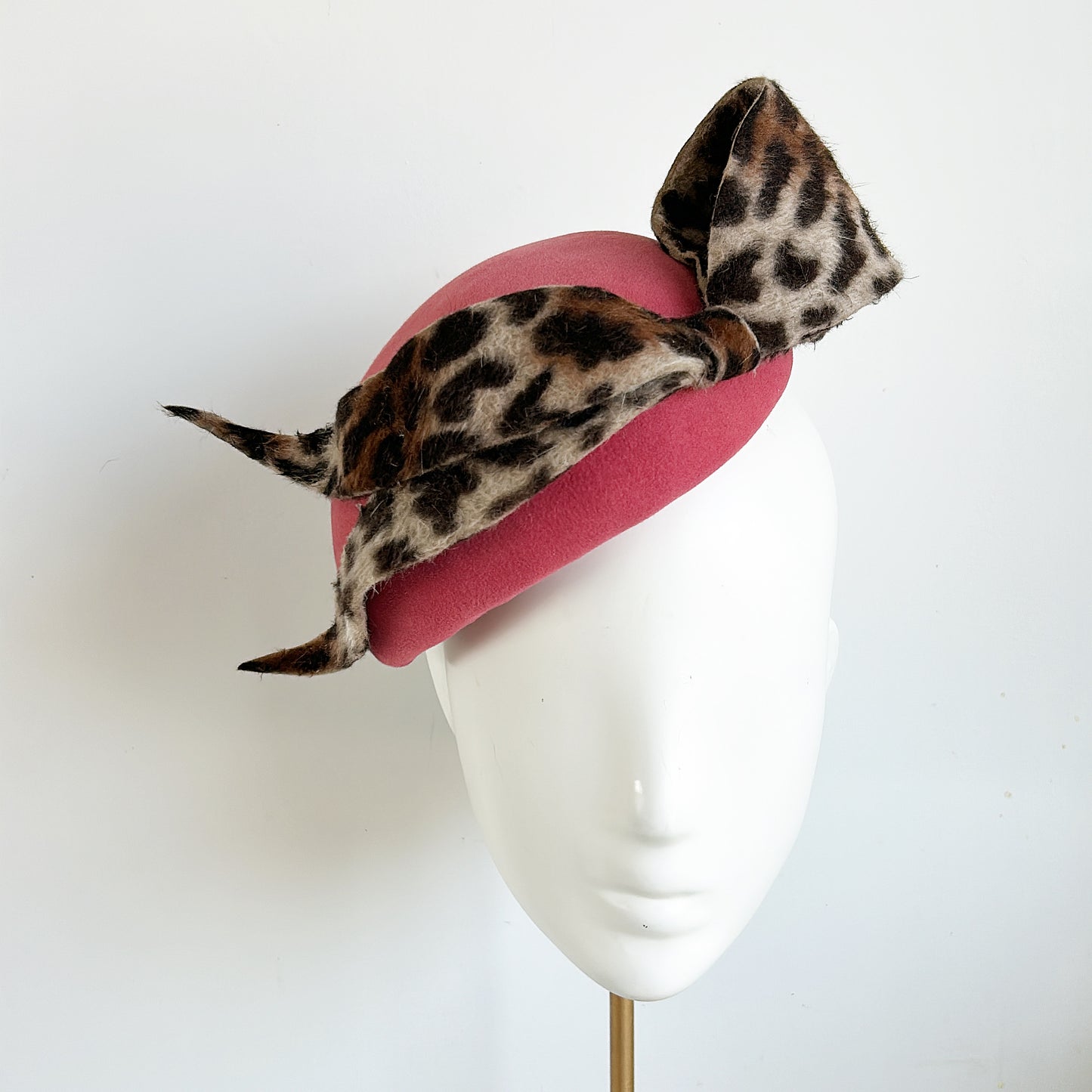 Raspberry fur felt tear drop with leopard sweeping bow